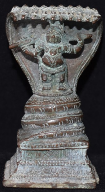 Krishna under Naga
